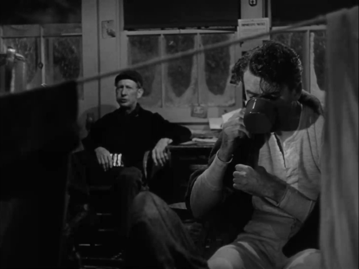 It's a Wonderful Life - Jimmy Stewart drinking from a coffee mug while wearing long underwear